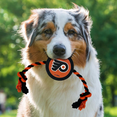NHL Philadelphia Flyers Puck Toy for Dogs & Cats. Play Hockey with Your Pet with This Licensed Dog Tough Toy Reward!