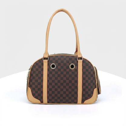 Breathable pet carrier, suitable for cats and dogs, comfortable, portable, crush-resistant, and foldable.